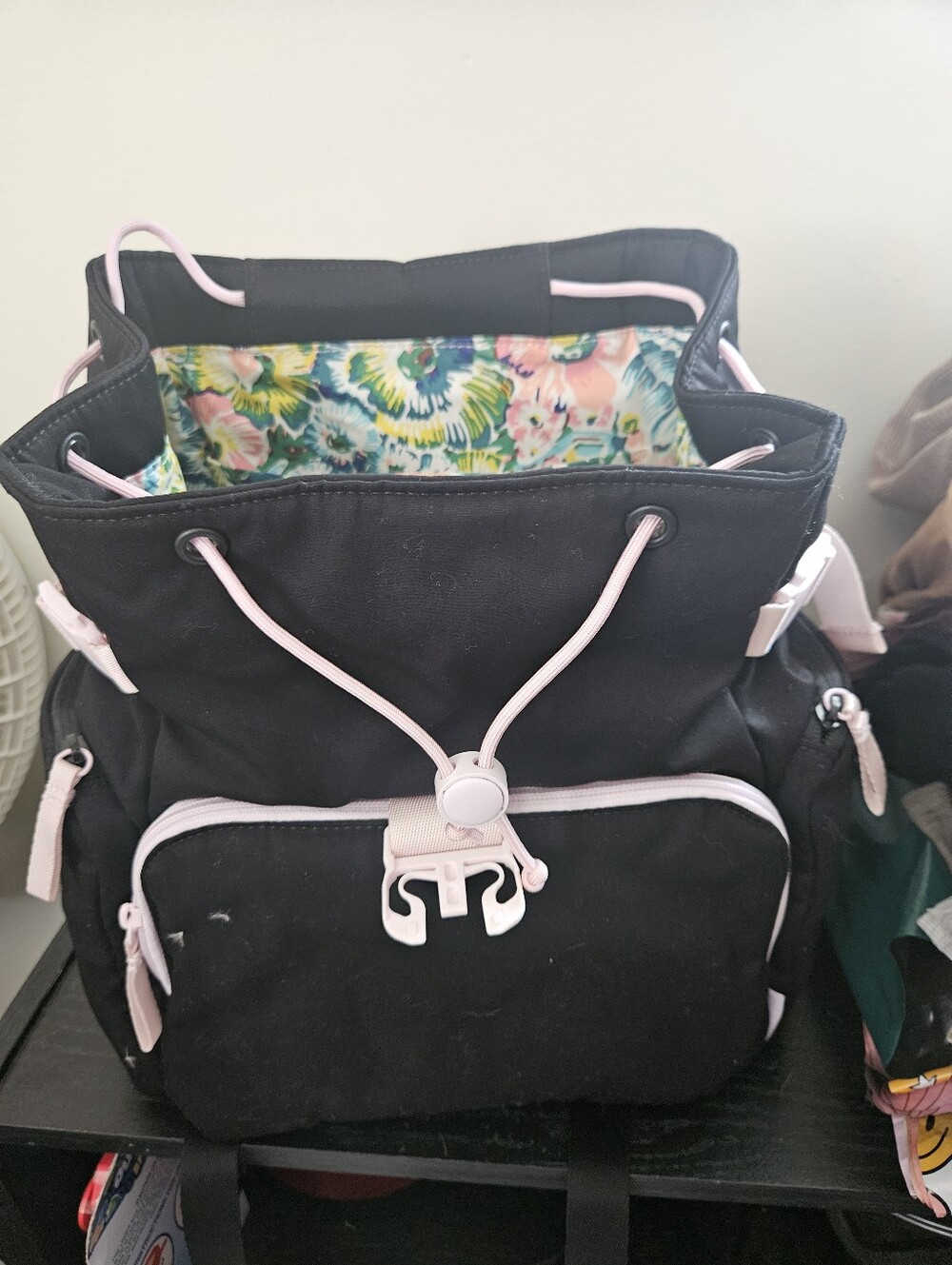 Black Canvas Drawstring Backpack with Pink Trim and Floral Lining